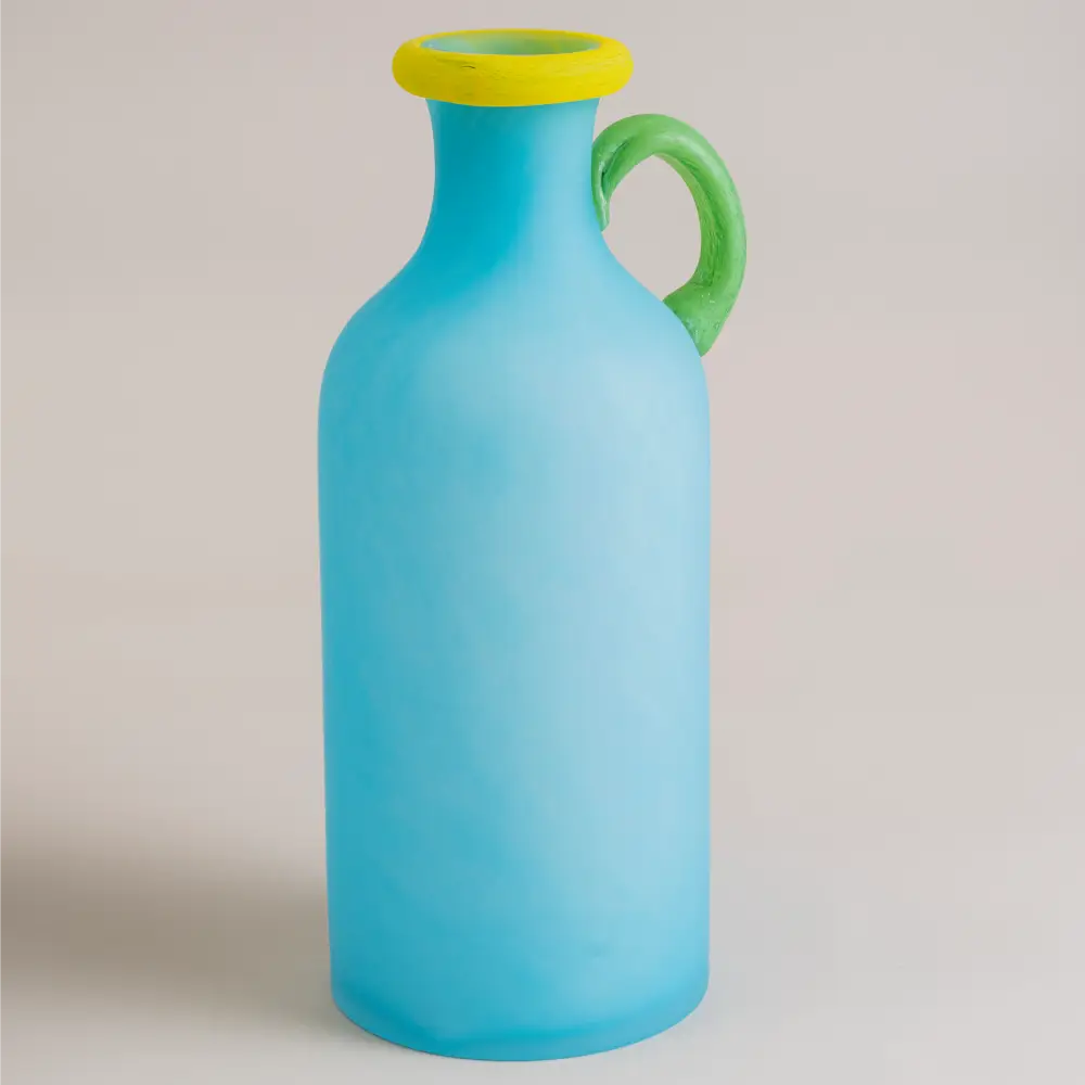 vase en verre pêche pastel avec anse jaune citronné