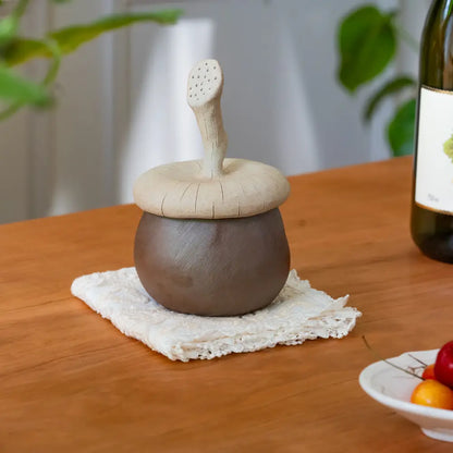Boîte de rangement avec couvercle moderne, pratique pour salle de bain, cuisine ou bureau.