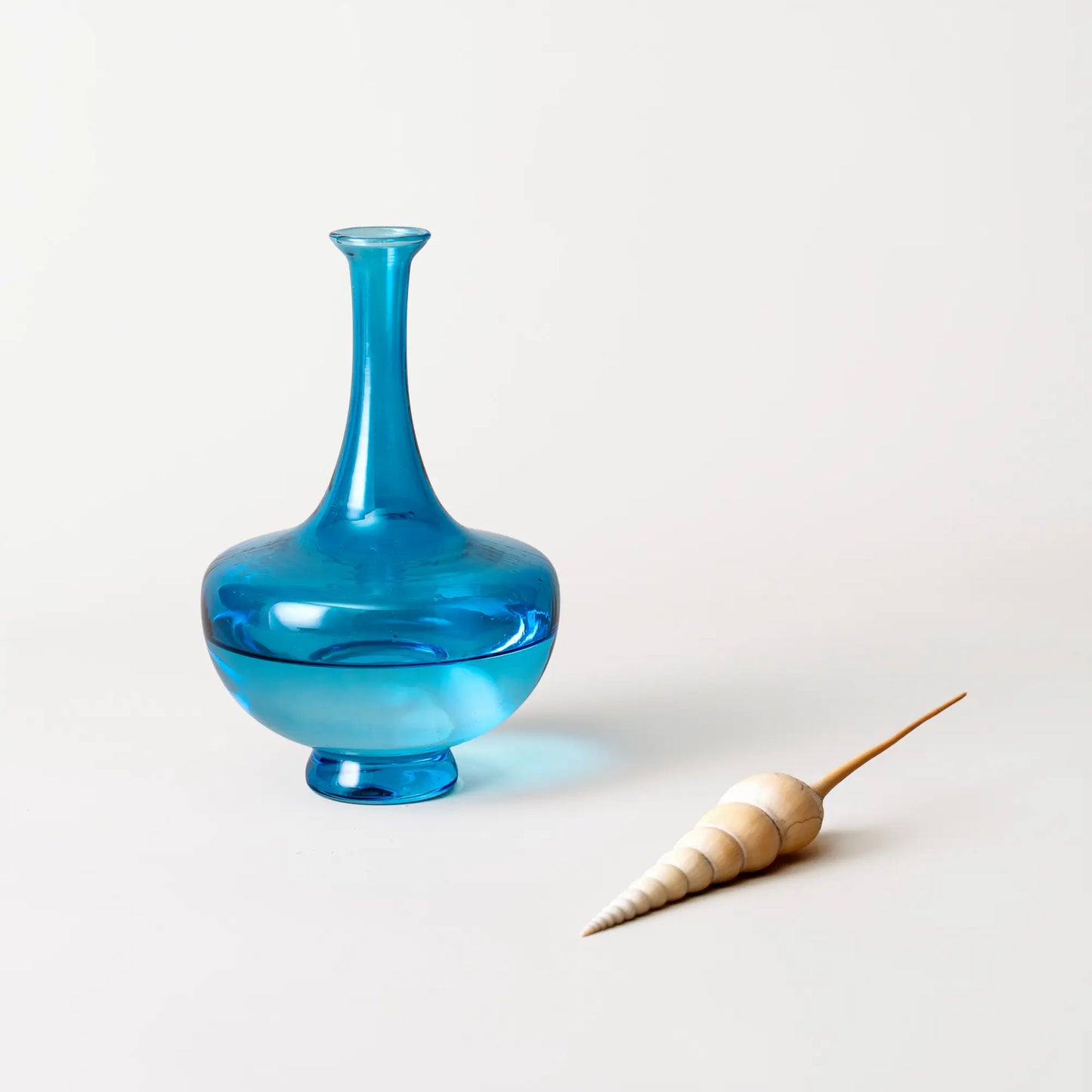 bouilloire en verre soufflé avec coquillage