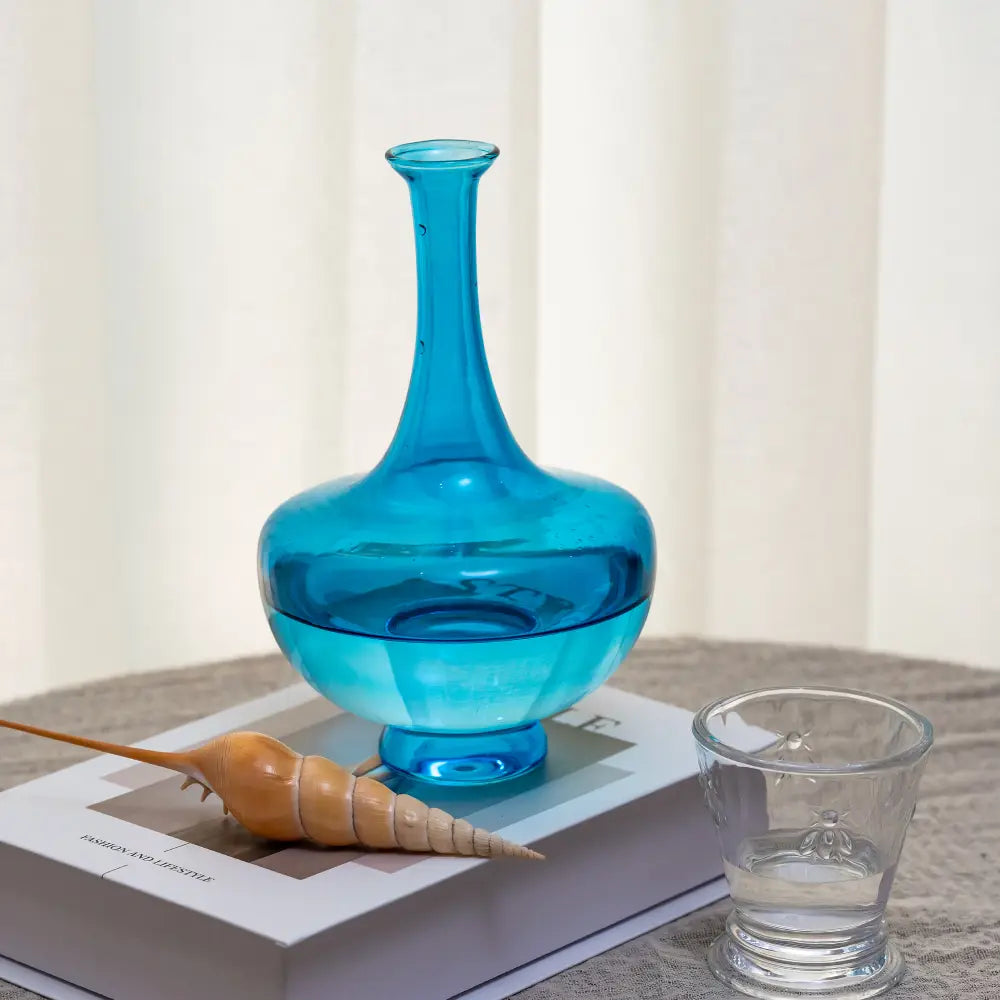 Bouilloire en verre design, silhouette fluide et poignée confortable