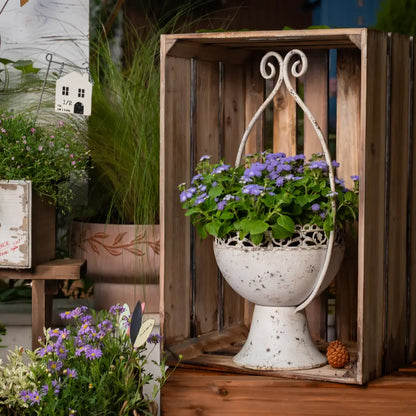 Pot de fleur blanc arrondi avec anse ajourée