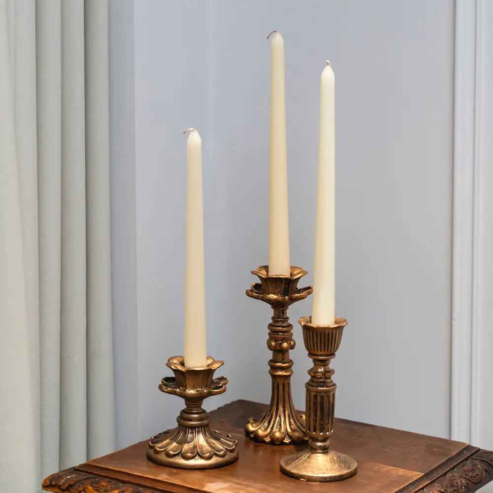 Trilogie de bougeoirs dorés – composition harmonieuse
